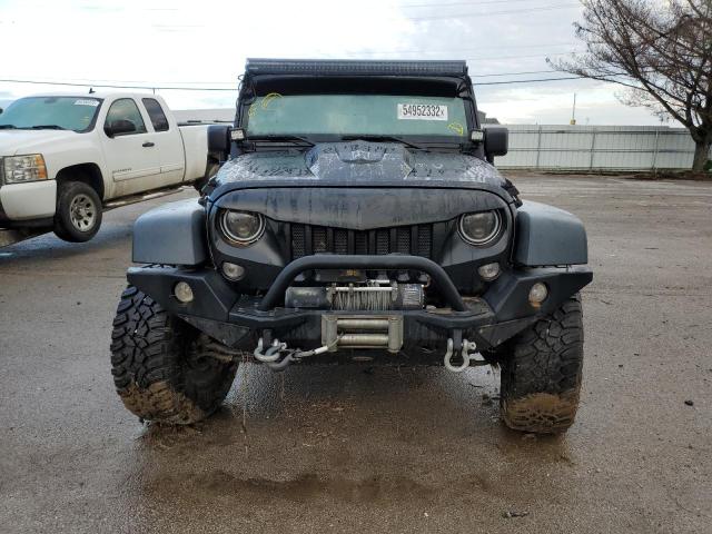 Photo 9 from auction – 2014 JEEP WRANGLER U with VIN 1C4BJWDG4EL135004
