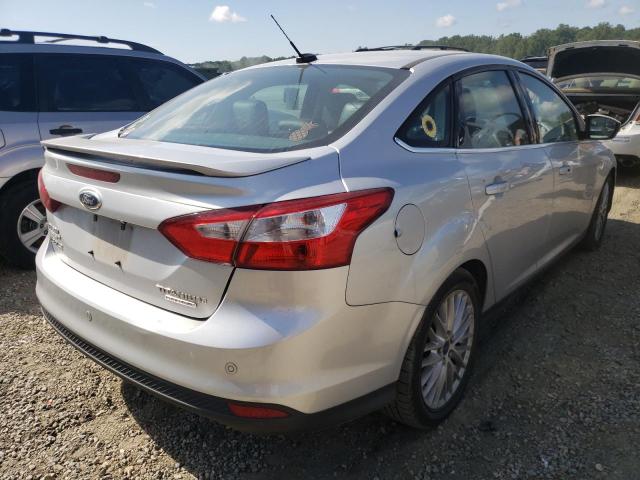 Photo 4 from auction – 2014 FORD FOCUS TITA with VIN 1FADP3J23EL447111