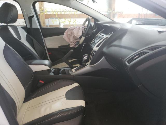 Photo 5 from auction – 2014 FORD FOCUS SE with VIN 1FADP3F23EL323994