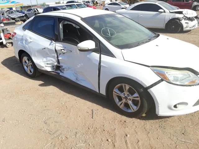 Photo 9 from auction – 2013 FORD FOCUS SE with VIN 1FADP3F23DL232268
