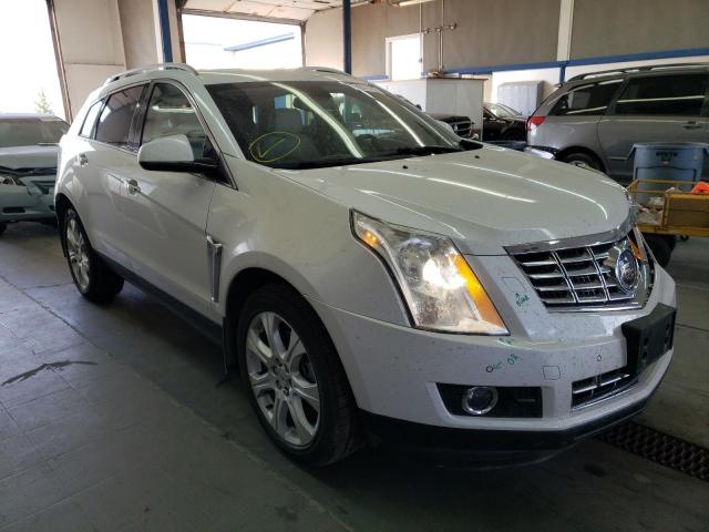 CADILLAC SRX PREMIU 2014 with VIN 3GYFNGE37ES620457 - Photo from auction