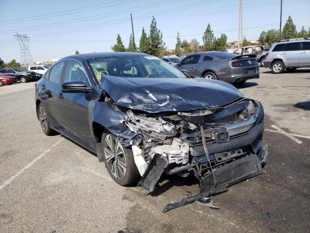 Photo 1 from auction – 2018 HONDA CIVIC EX with VIN JHMFC1F31JX009144