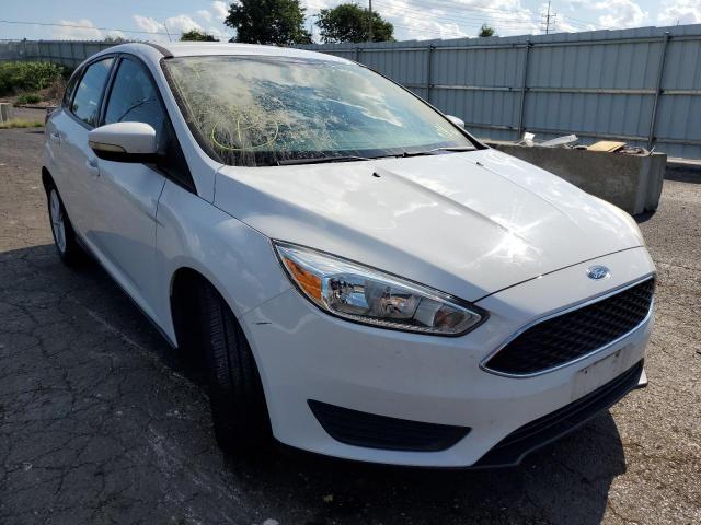 FORD FOCUS SE 2015 with VIN 1FADP3K20FL223357 - Photo from auction