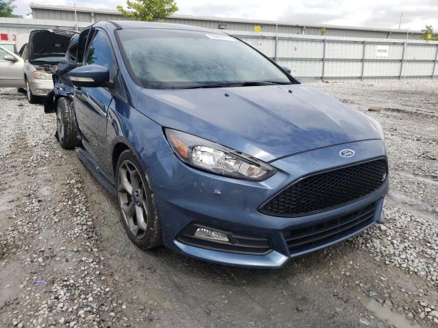FORD FOCUS ST 2018 with VIN 1FADP3L94JL228386 - Photo from auction