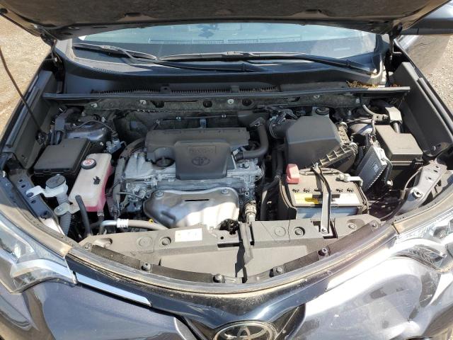 Photo 7 from auction – 2018 TOYOTA RAV4 LE with VIN JTMBFREV8JJ731674