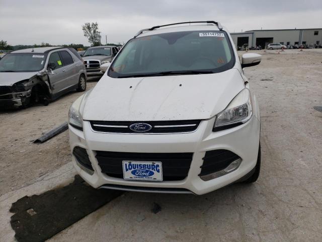 Photo 9 from auction – 2014 FORD ESCAPE TIT with VIN 1FMCU0JX0EUC44868