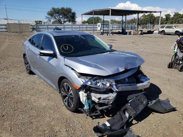 HONDA CIVIC EXL 2018 with VIN 19XFC1F70JE201093 - Photo from auction