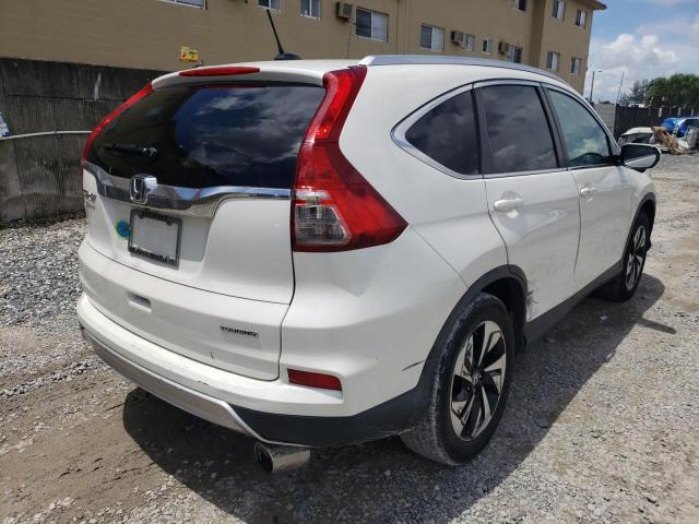 Photo 4 from auction – 2015 HONDA CR-V TOURI with VIN 5J6RM3H91FL016001