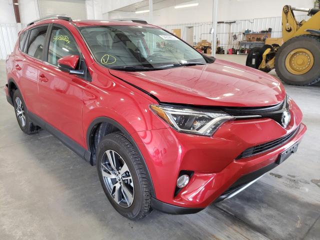 Photo 1 from auction – 2017 TOYOTA RAV4 XLE with VIN 2T3RFREV0HW664479