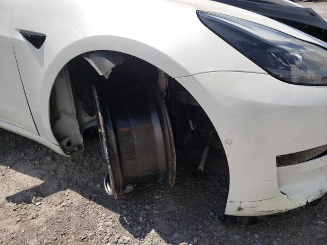 Photo 9 from auction – 2022 TESLA MODEL 3 with VIN 5YJ3E1EB1NF107968