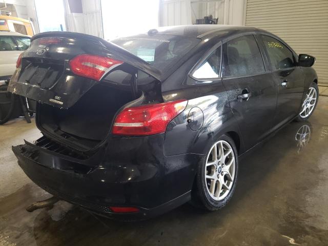 Photo 4 from auction – 2015 FORD FOCUS SE with VIN 1FADP3F20FL374385