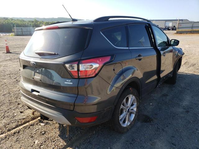 Photo 4 from auction – 2018 FORD ESCAPE SE with VIN 1FMCU0GD4JUD07008