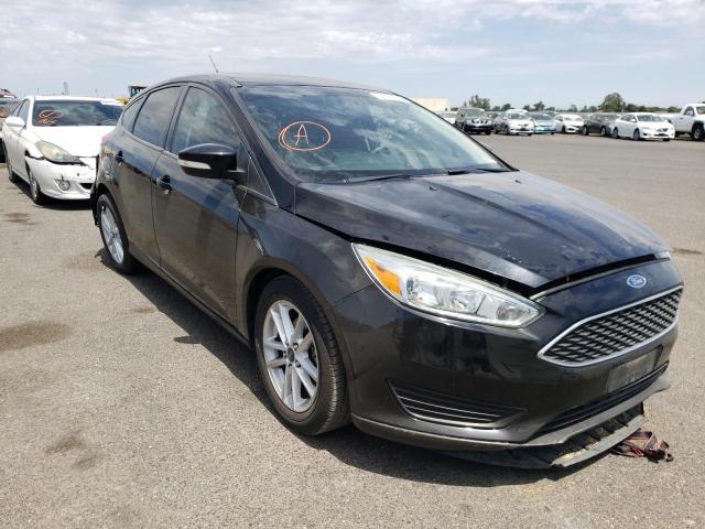 FORD FOCUS SE 2016 with VIN 1FADP3K2XGL338243 - Photo from auction