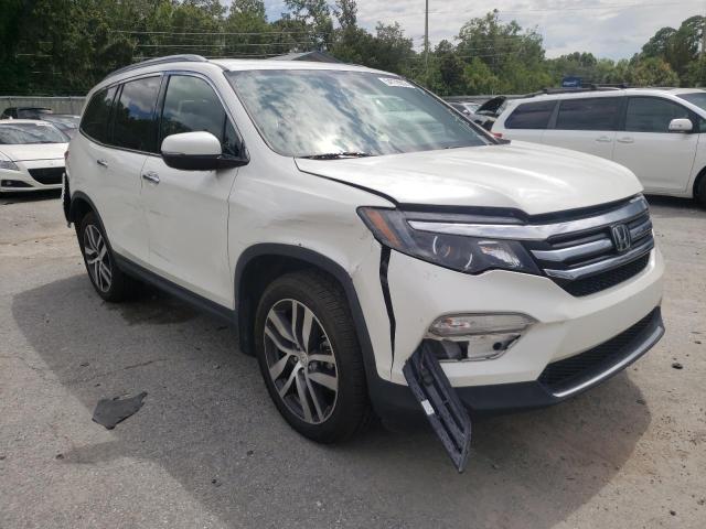 HONDA PILOT ELIT 2017 with VIN 5FNYF6H05HB050317 - Photo from auction