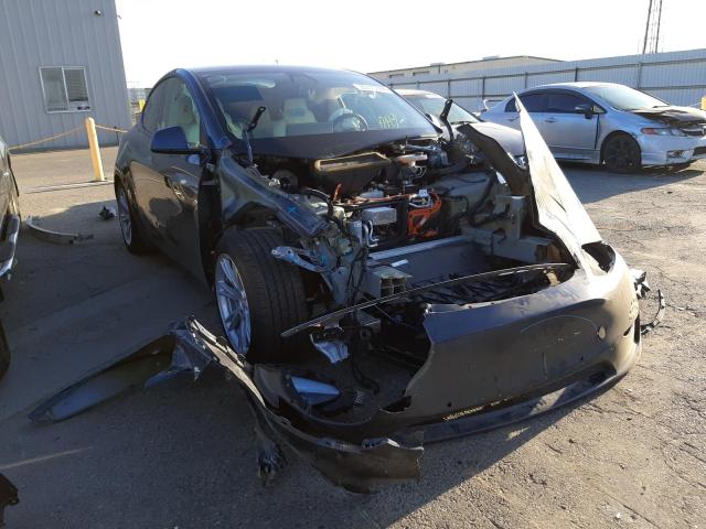 TESLA MODEL Y 2021 with VIN 5YJYGDEE0MF158470 - Photo from auction