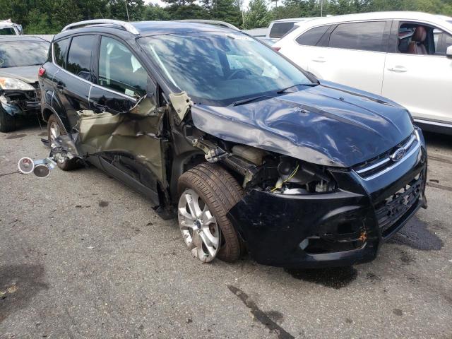 FORD ESCAPE TIT 2016 with VIN 1FMCU9JX1GUB86034 - Photo from auction