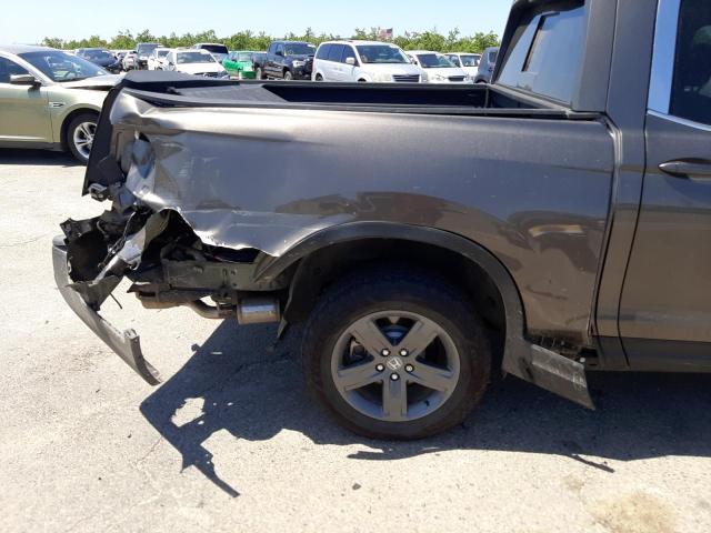 Photo 9 from auction – 2022 HONDA RIDGELINE with VIN 5FPYK3F51NB017133