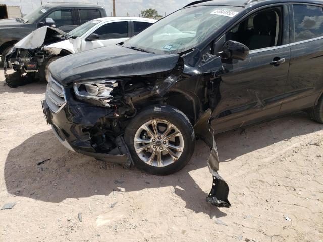 Photo 9 from auction – 2018 FORD ESCAPE SE with VIN 1FMCU0GD4JUA44017