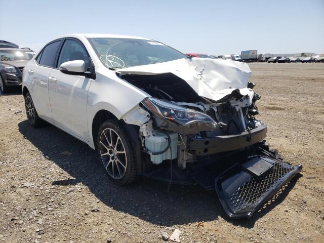 TOYOTA COROLLA L 2017 with VIN 5YFBURHE9HP613351 - Photo from auction