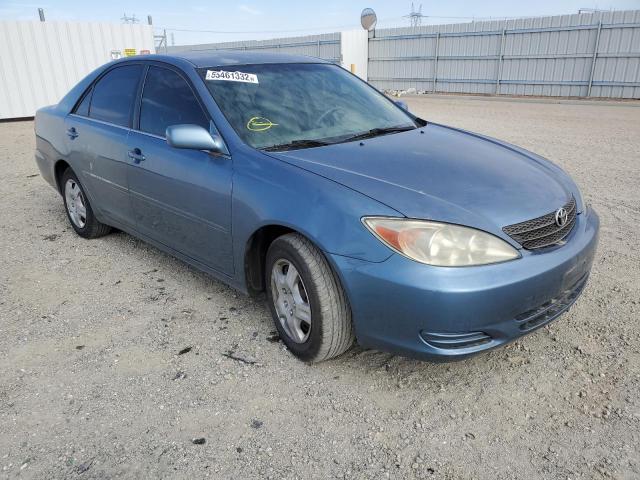 TOYOTA CAMRY LE 2002 with VIN JTDBE32K020050314 - Photo from auction