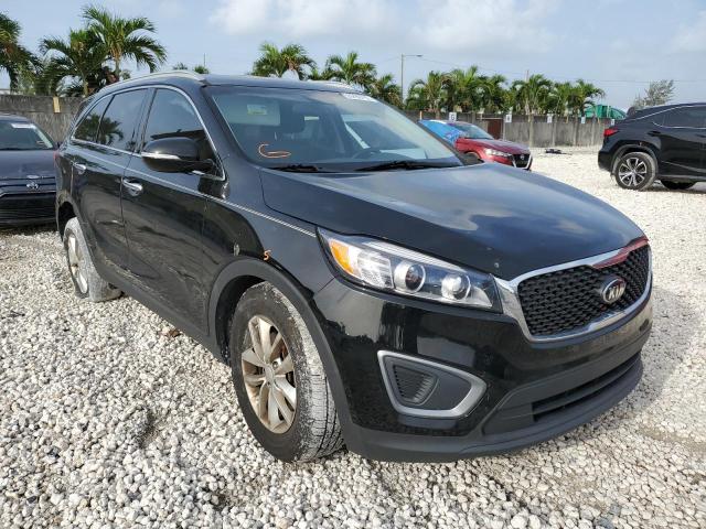 KIA SORENTO LX 2016 with VIN 5XYPG4A33GG015803 - Photo from auction