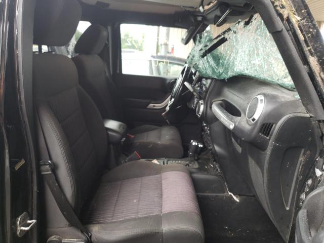 Photo 5 from auction – 2011 JEEP WRANGLER U with VIN 1J4BA5H11BL554997