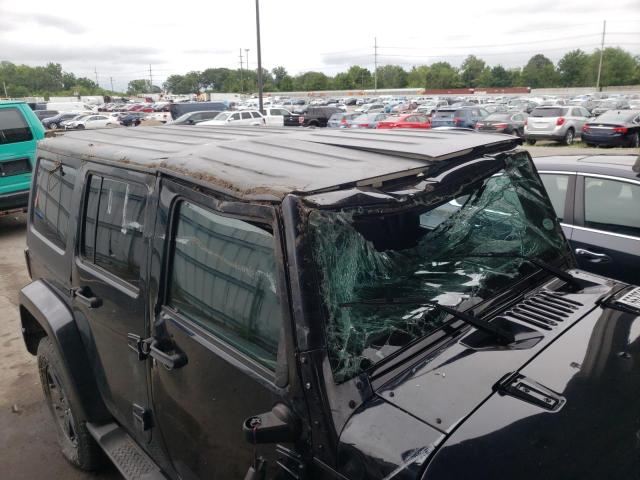 Photo 9 from auction – 2011 JEEP WRANGLER U with VIN 1J4BA5H11BL554997