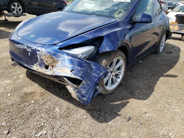 Photo 9 from auction – 2021 TESLA MODEL Y with VIN 5YJYGDEE2MF140813