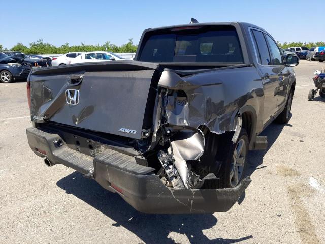 Photo 4 from auction – 2022 HONDA RIDGELINE with VIN 5FPYK3F51NB017133