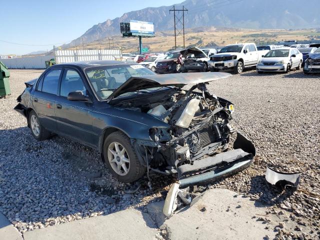 TOYOTA COROLLA DX 1997 with VIN 1NXBA02E2VZ599302 - Photo from auction