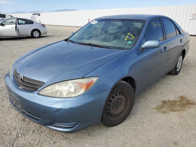 Photo 2 from auction – 2002 TOYOTA CAMRY LE with VIN JTDBE32K020050314