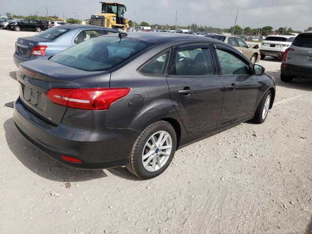 Photo 4 from auction – 2018 FORD FOCUS SE with VIN 1FADP3F2XJL276487