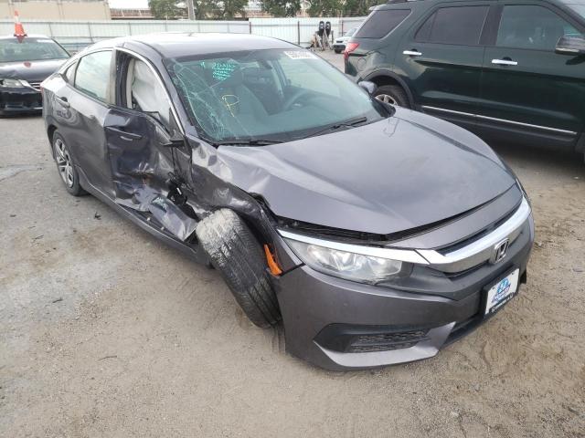HONDA CIVIC LX 2017 with VIN 19XFC2F58HE077654 - Photo from auction