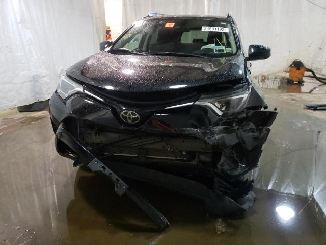 Photo 9 from auction – 2018 TOYOTA RAV4 LE with VIN 2T3BFREV1JW841256
