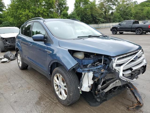 FORD ESCAPE SE 2018 with VIN 1FMCU9GD9JUC85317 - Photo from auction