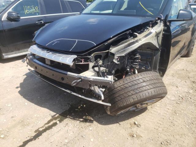 Photo 9 from auction – 2021 TESLA MODEL Y with VIN 5YJYGDEE9MF086409