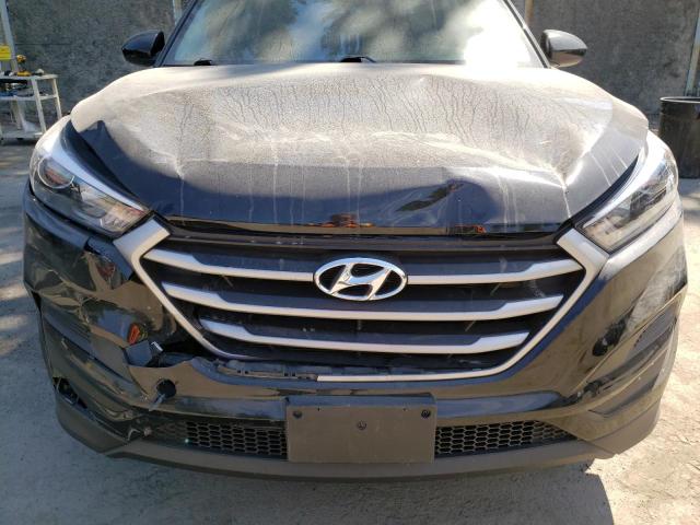 Photo 9 from auction – 2018 HYUNDAI TUCSON SE with VIN KM8J2CA41JU764513