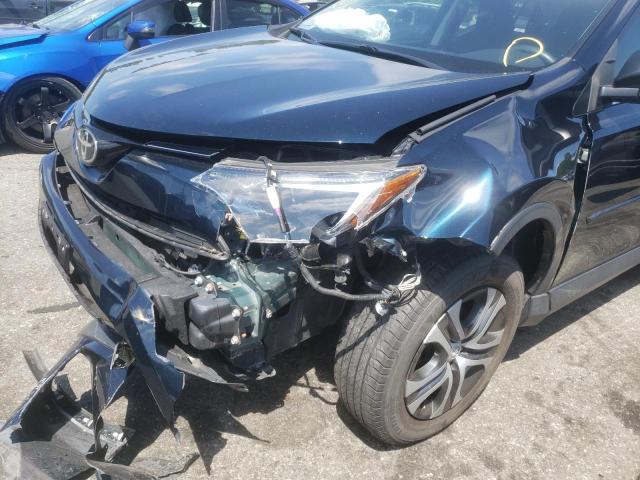 Photo 9 from auction – 2017 TOYOTA RAV4 LE with VIN JTMBFREV9HJ153479