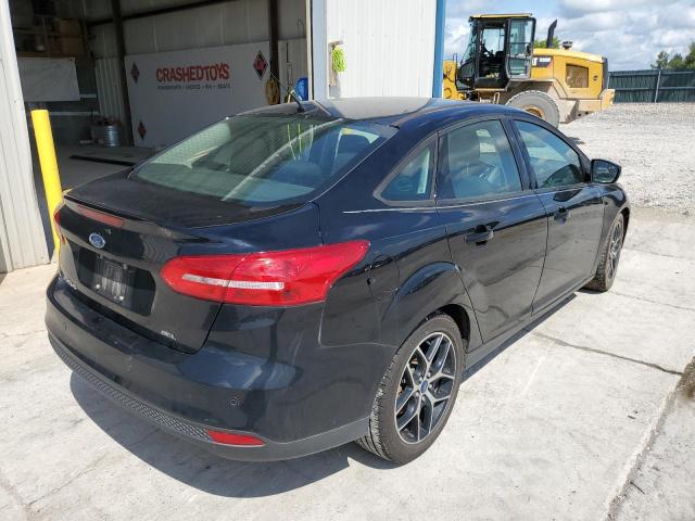 Photo 4 from auction – 2018 FORD FOCUS SEL with VIN 1FADP3H29JL240643