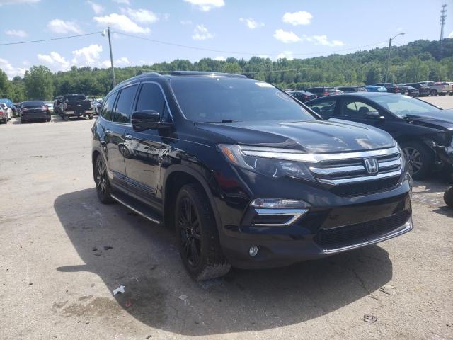HONDA PILOT TOUR 2018 with VIN 5FNYF6H98JB030566 - Photo from auction