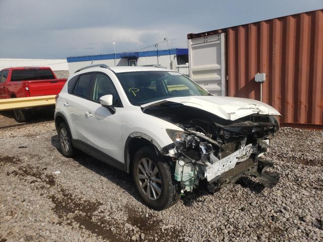 MAZDA CX-5 TOURI 2015 with VIN JM3KE2CYXF0484458 - Photo from auction