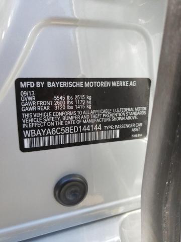 Photo 10 from auction – 2014 BMW 740 I with VIN WBAYA6C58ED144144