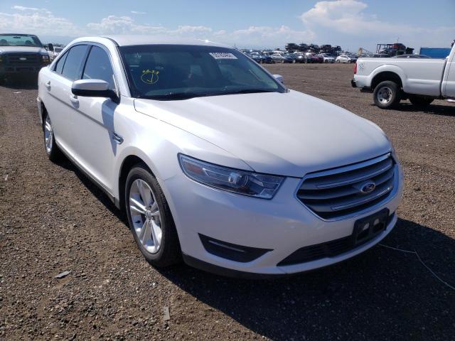 FORD TAURUS SEL 2014 with VIN 1FAHP2H8XEG139982 - Photo from auction