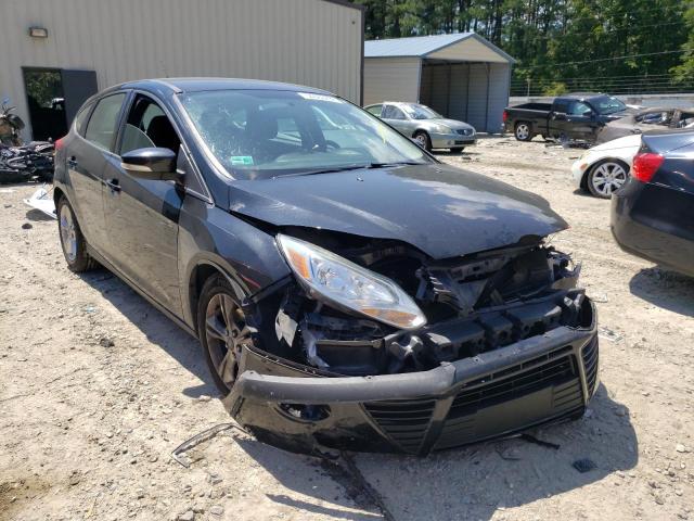 FORD FOCUS 2014 with VIN 1FADP3K21EL164320 - Photo from auction