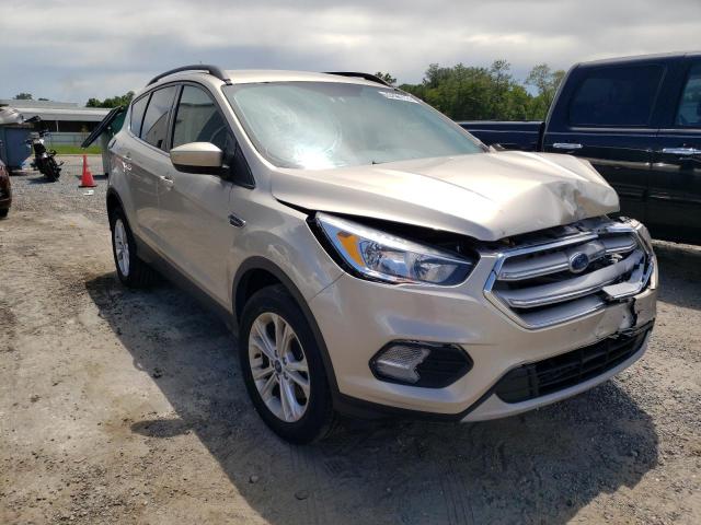 Photo 1 from auction – 2018 FORD ESCAPE SE with VIN 1FMCU9GD3JUA47611