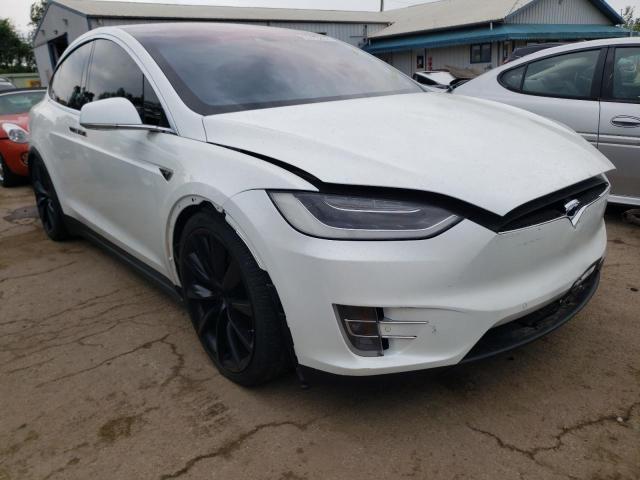 TESLA MODEL X 2016 with VIN 5YJXCAE4XGF006830 - Photo from auction