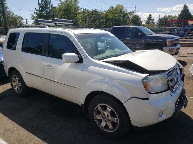 HONDA PILOT TOUR 2011 with VIN 5FNYF4H97BB025848 - Photo from auction
