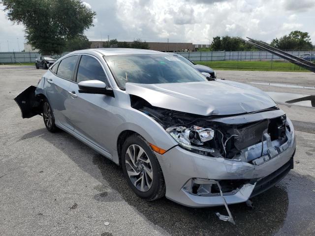 HONDA CIVIC EX 2018 with VIN 19XFC2F72JE013844 - Photo from auction