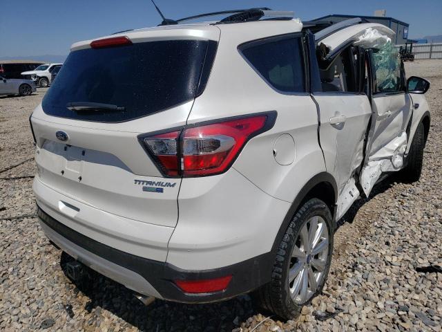 Photo 4 from auction – 2017 FORD ESCAPE TIT with VIN 1FMCU9J95HUA95092