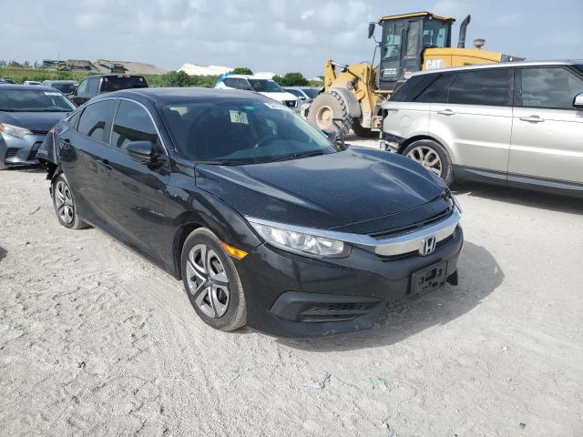 HONDA CIVIC LX 2017 with VIN 19XFC2F55HE229566 - Photo from auction